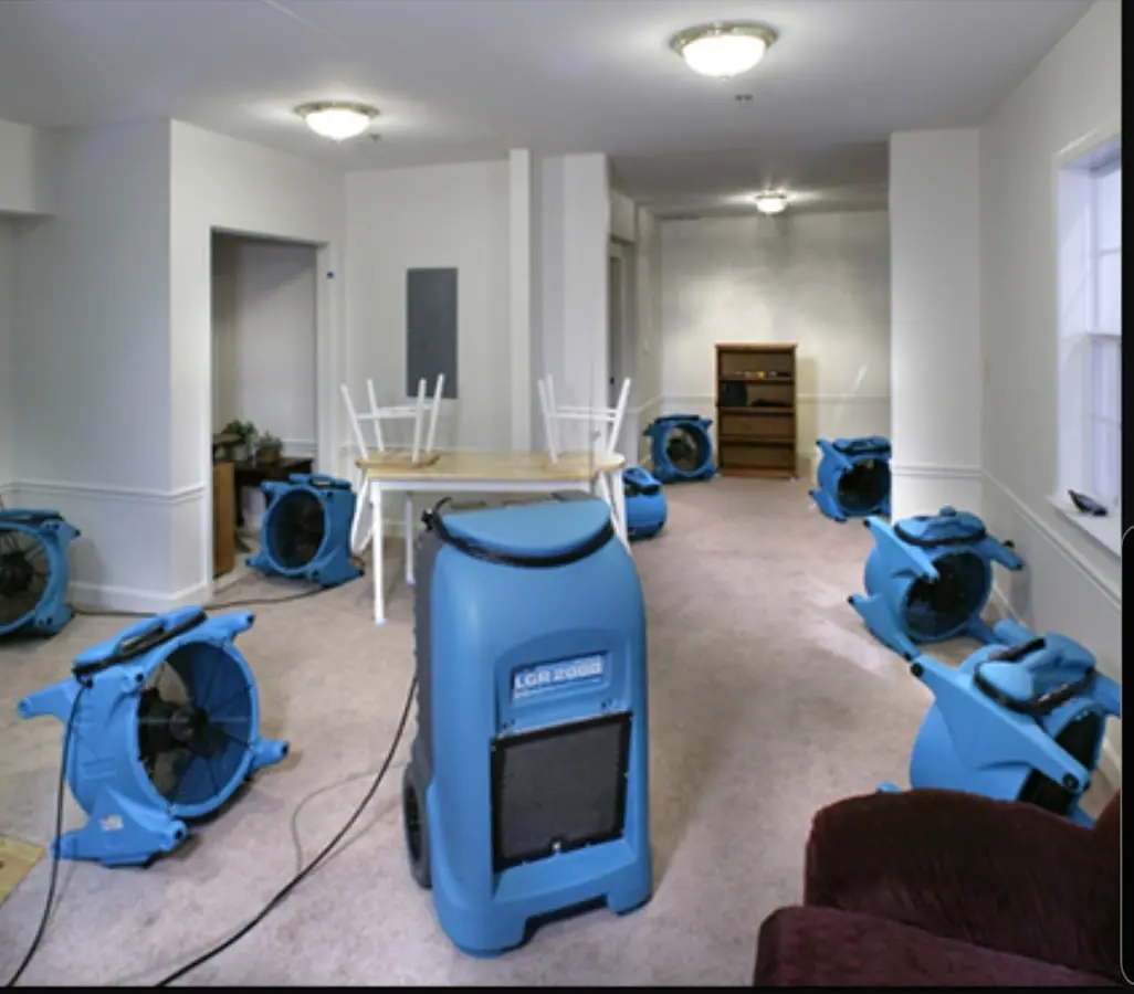 Air movers and dehumidifier setup for Water Damage Restoration in Waupaca